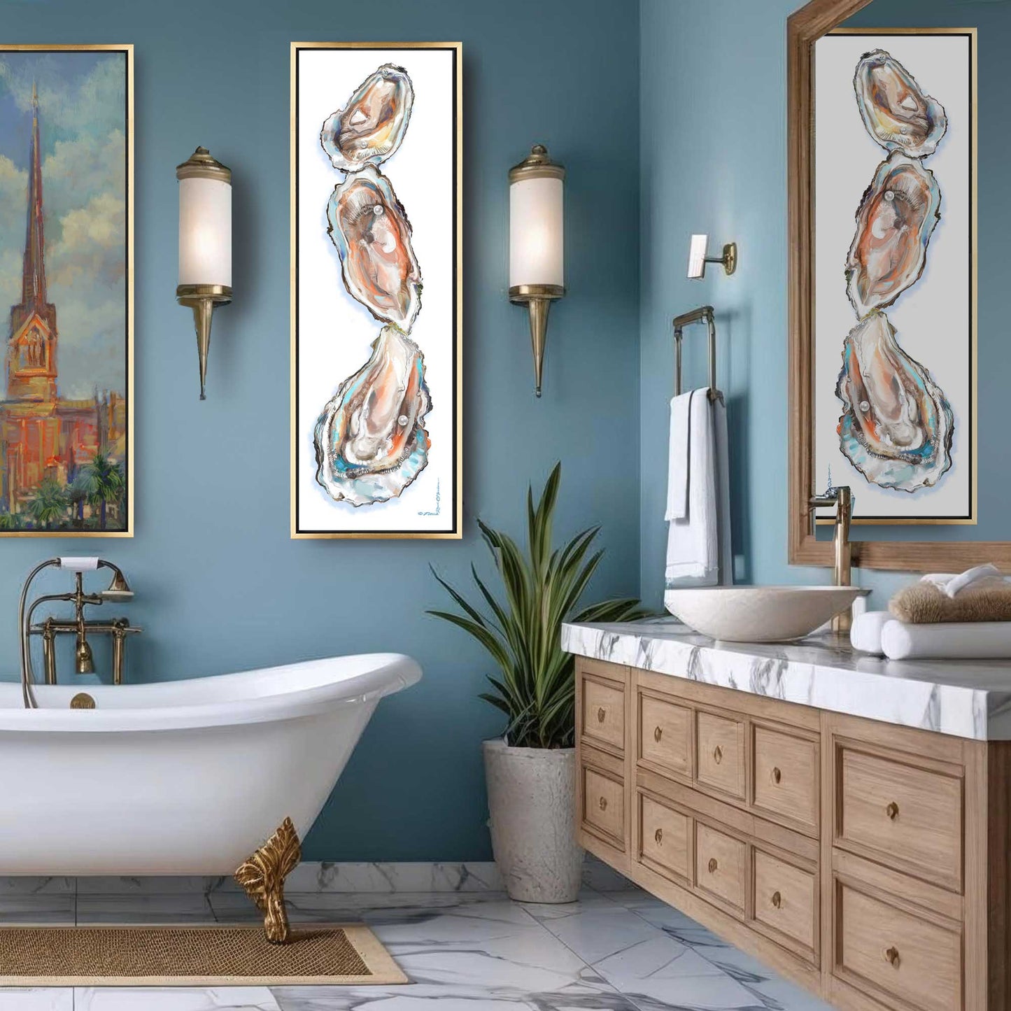 Bathroom interior with blue walls, a freestanding bathtub, wooden vanity, and decorative artwork.