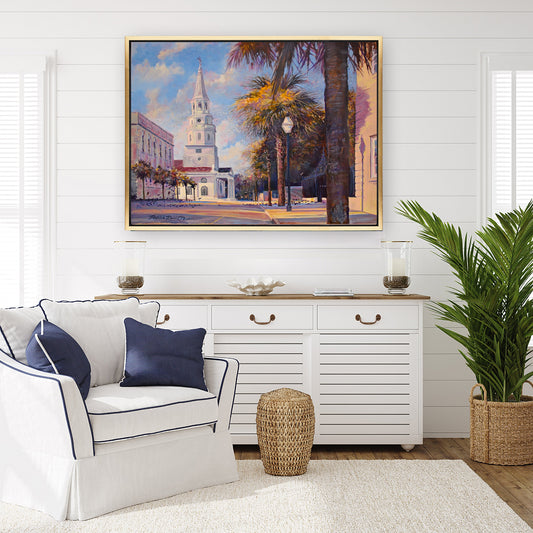 Luxury living room with Shiplap walls and Charleston streetscape by Patrick Reid O'Brien framed in gold float frame ..